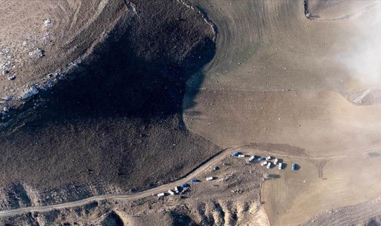 Libyan military delegation examining wreckage of crashed Libyan military delegation examining wreckage of crashed