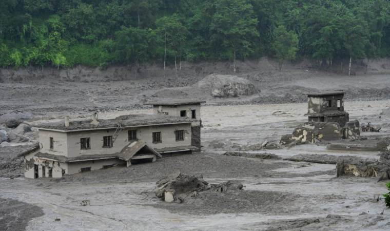 Death toll from floods on Nepal-China border hits 1,400 Death toll from floods on Nepal-China border hits 1,400
